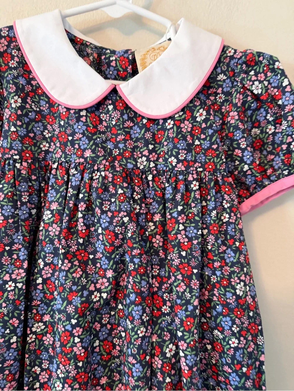 The Beaufort Bonnet Company Navy Floral Peter Pan Collar Bubble with Pink Trim